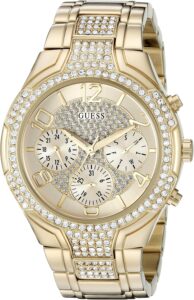 GUESS Women’s Gold-Tone Stainless Steel Crystal Embellished Bracelet Watch with Day, Date + 24 Hour Military/Int’l Time. Color: Gold-Tone (Model: U0628L2)