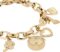 Anne Klein Women’s Premium Crystal Accented Gold-Tone Charm Bracelet Watch, 10/7604CHRM
