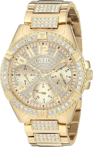 GUESS Gold-Tone Stainless Steel Crystal Watch with Day, Date + 24 Hour Military/Int’l Time. Color: Gold-Tone (Model: U1156L2)
